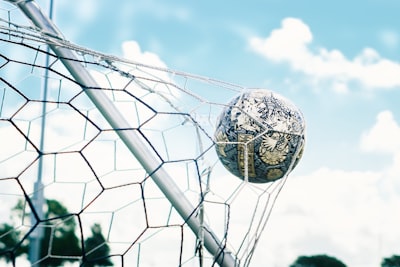 Score a goal — забить гол