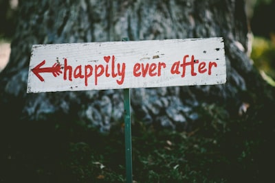 Unhappily — грустно
